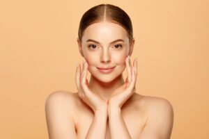 Beautiful girl showing her smooth and young face. Dr. Mark Deuber - Dallas TX